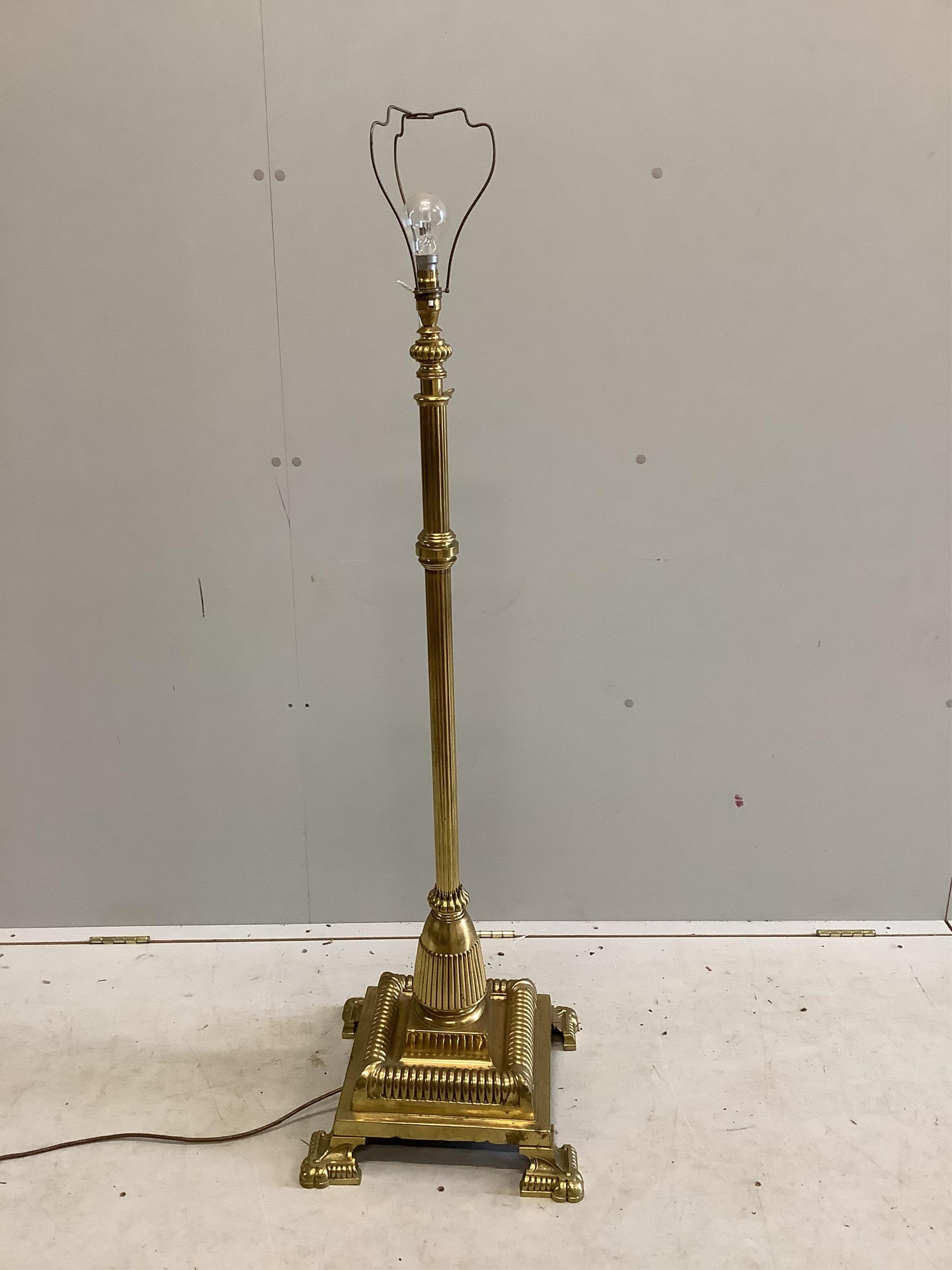 A brass telescopic standard lamp. Condition - fair